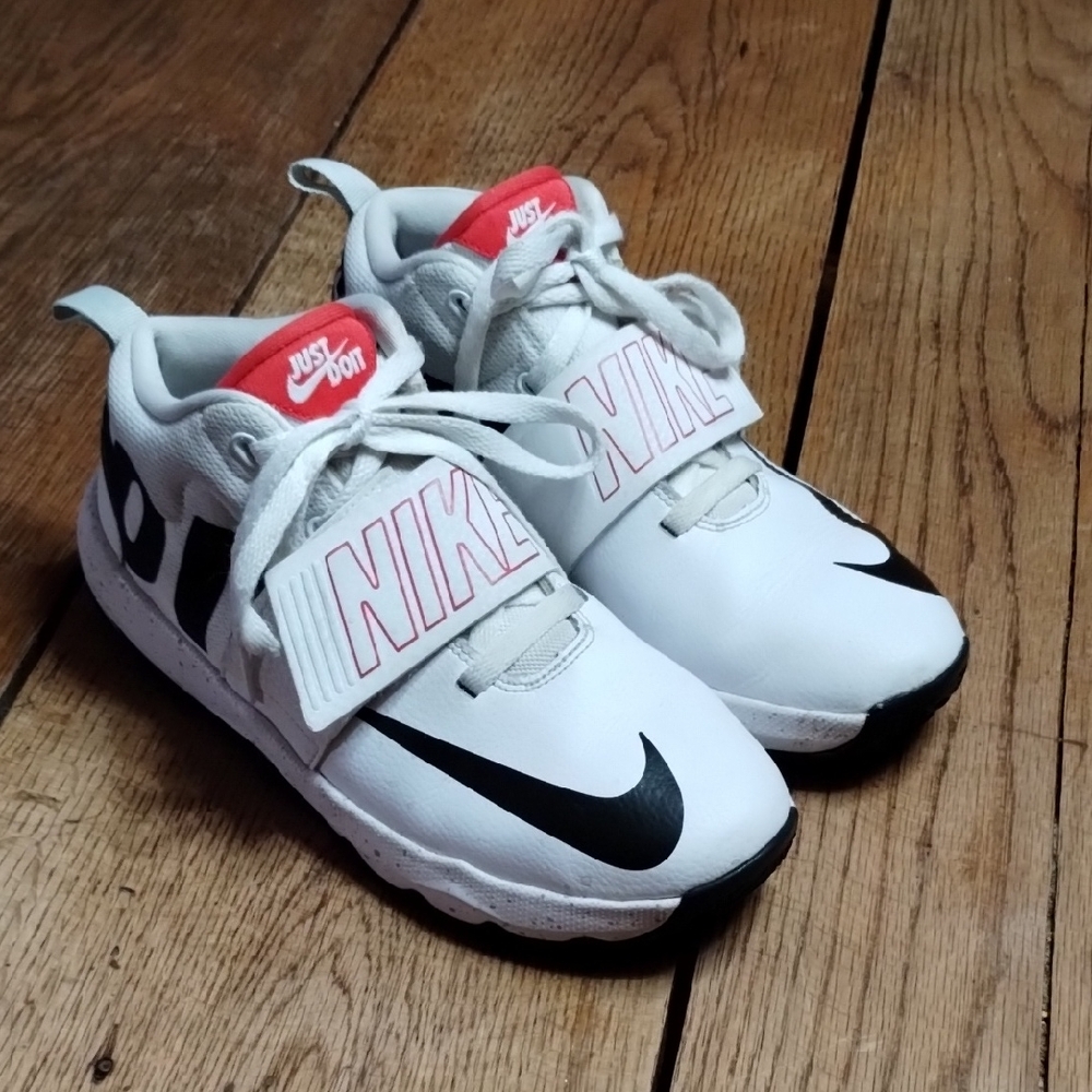 Nike Kids White and Black Sneakers with Red Accents